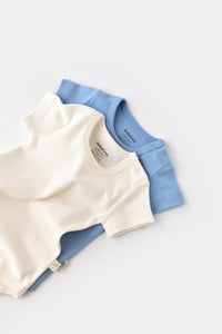 Body manches courtes pour bébé couleur écru bleu en 100% coton biologique GOTS interlock Slow fashion vêtement bébé éthique durable éco-responsable