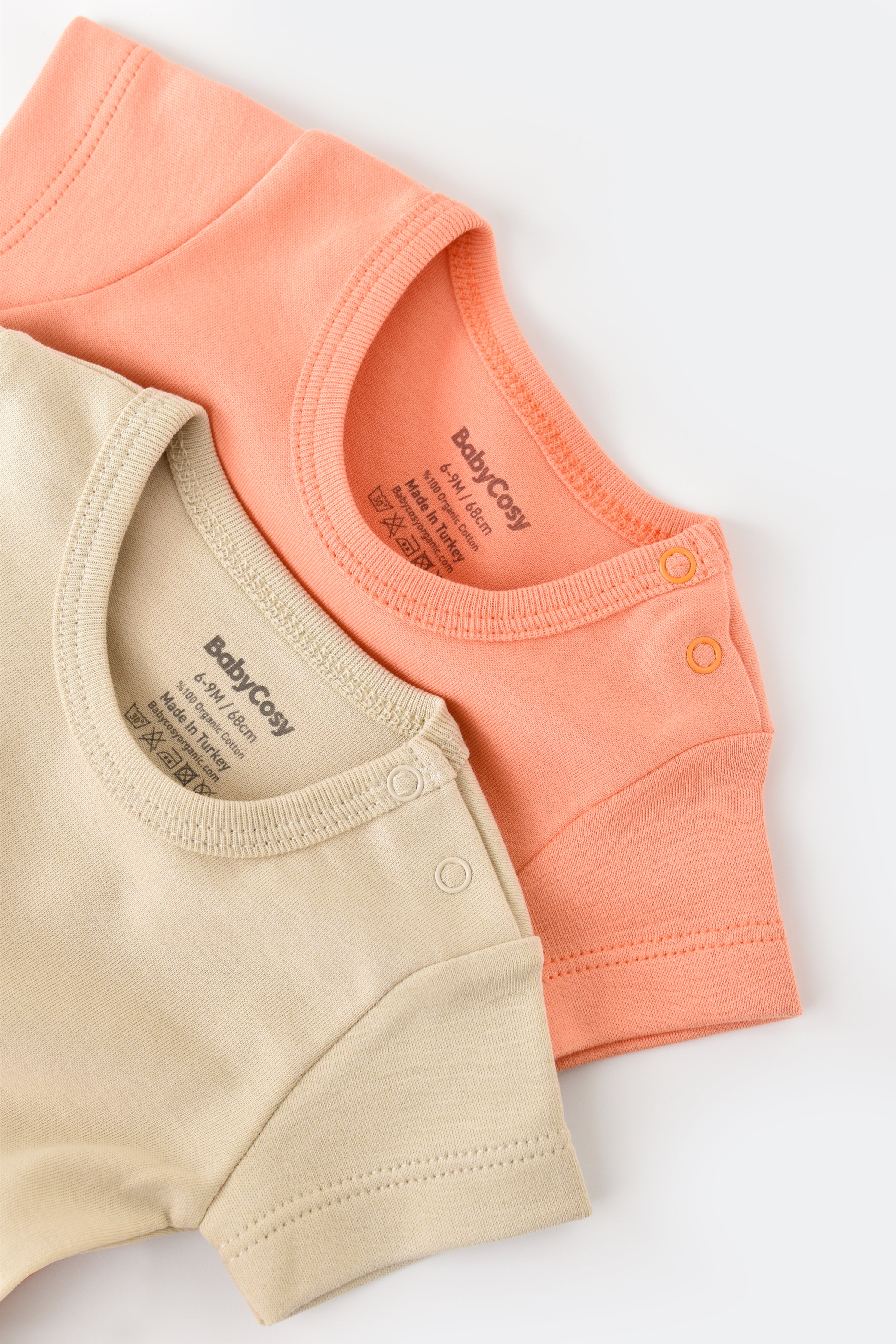 Body manches courtes pour bébé couleur rose claire crème en 100% coton biologique GOTS interlock Slow fashion vêtement bio bébé éthique durable éco-responsable